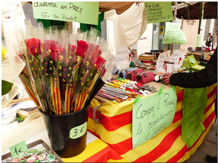 바르셀로나 거리 산 조르디 축제에서 책과 장미를 파는 판매대 2019 - 출처: Sant Jordi 2019, calafellvalo, CC BY-NC-ND 2.0, flickr